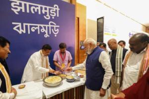 PM eats 'Jhal Muri' once again, this time served by CM Adhikari  As TMC rebel bloc set to join NDA